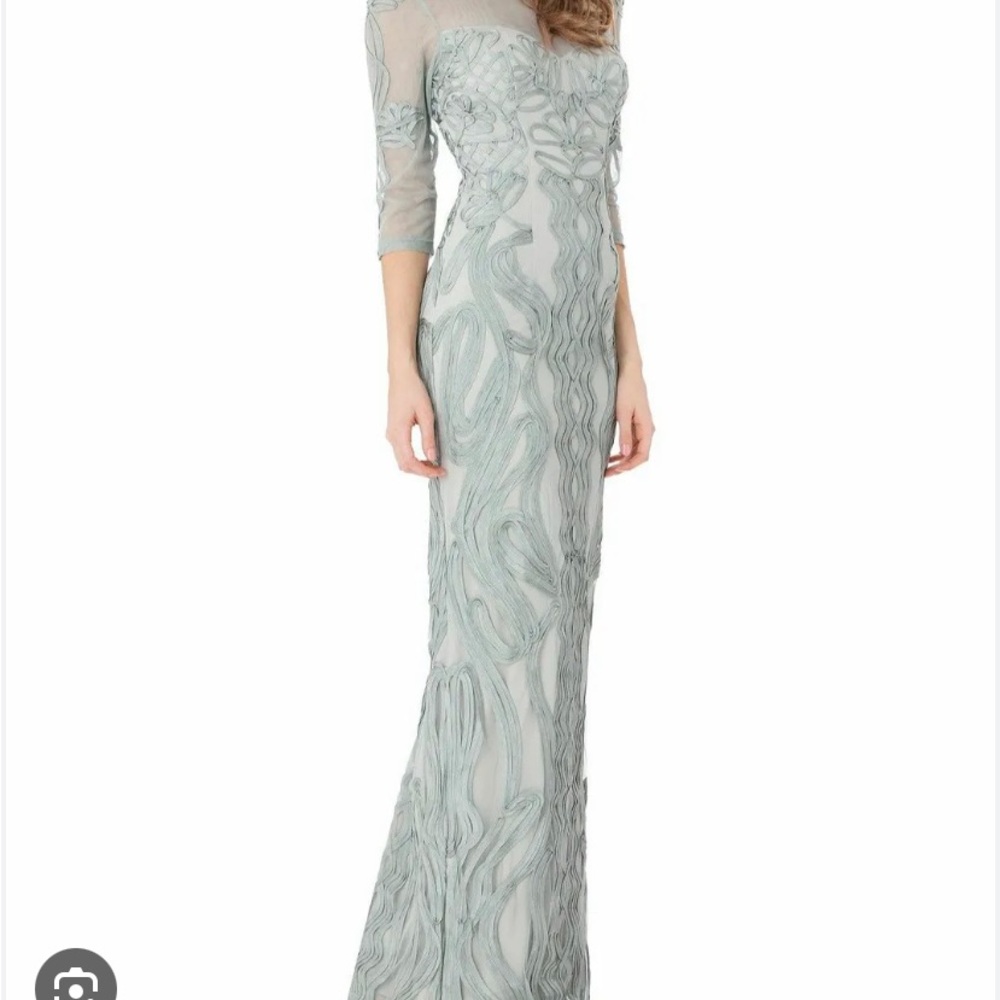 Worn JS Collections formal with no visible flaws or wear.  Giving material.